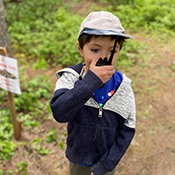 boy talking on walkie-talkie