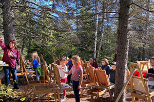 Students creating art in the wilderness