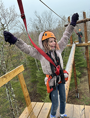 Student on ropes course