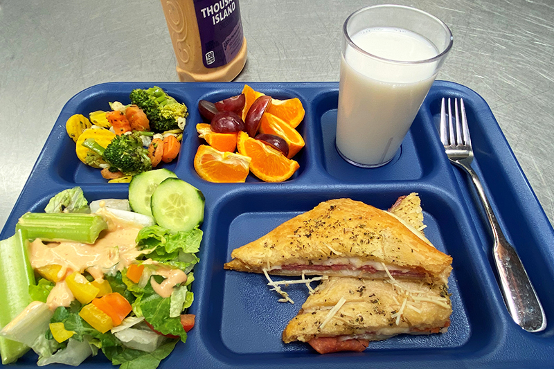 Baked Italian sandwich, Normandy vegetables, green salad, fruit & milk