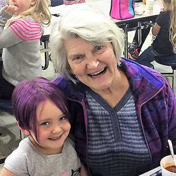 Grandma visiting student with purple hair
